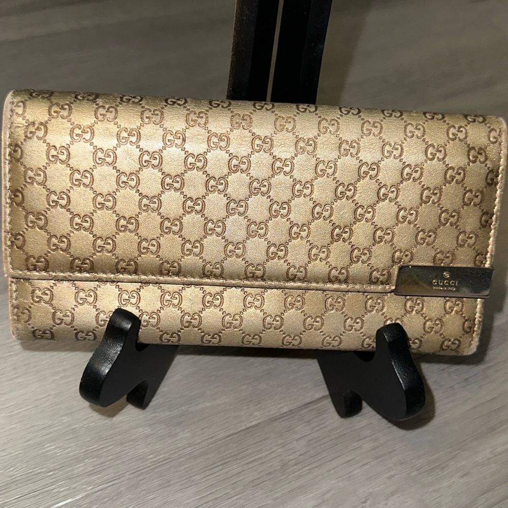 Gucci gold tone, long authentic flap wallet
